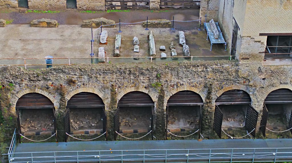Herculaneum, photo taken between October 2014 and November 2019.
Looking north towards Sacred Area terrace from access roadway, with boatsheds below. Photo courtesy of Giuseppe Ciaramella.
